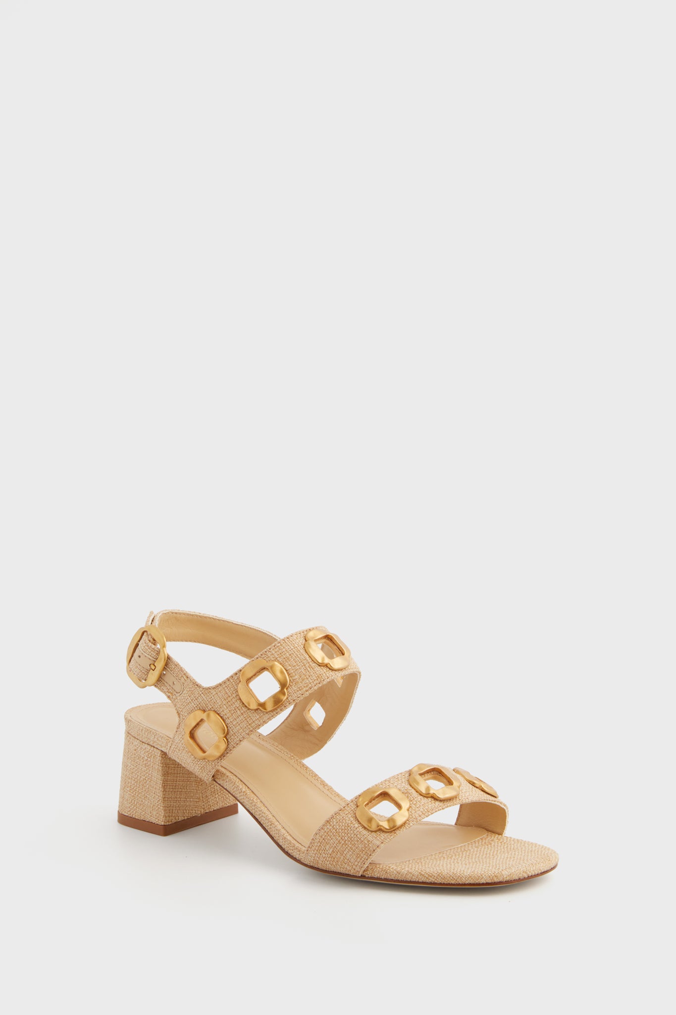 Larroude beige Milan sandal with a medium block heel, two front straps adorned with chunky chain details, and an ankle strap secured by a buckle.