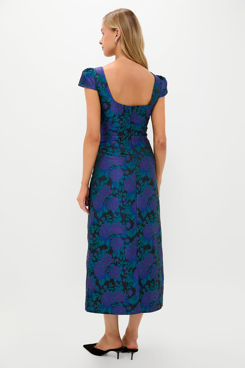 Navy & Indigo Jacquard Archibald Maxi Dress features classic elegance with a fitted waist, puffed sleeves, and a low back, embodying effortless, high-end style.