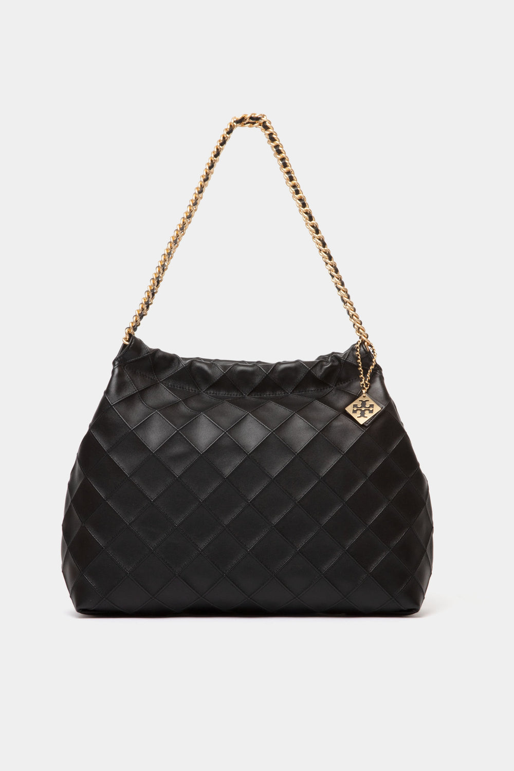 A Tory Burch Black Fleming Soft Drawstring Hobo handbag with quilted design, gold chain strap, and a small gold logo charm.