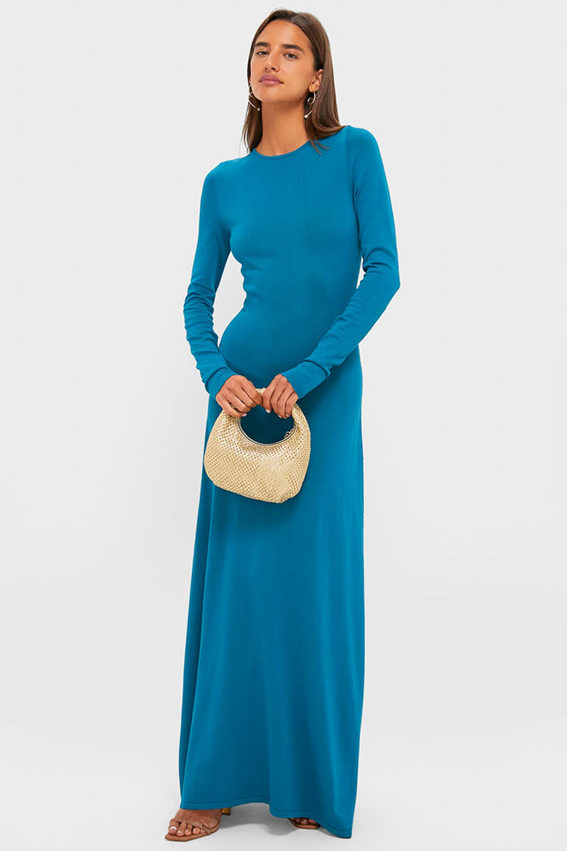 Model showcases the classic Gold Eden Woven Hobo, effortlessly styled with a chic maxi dress, embodying high-end, fun fashion.