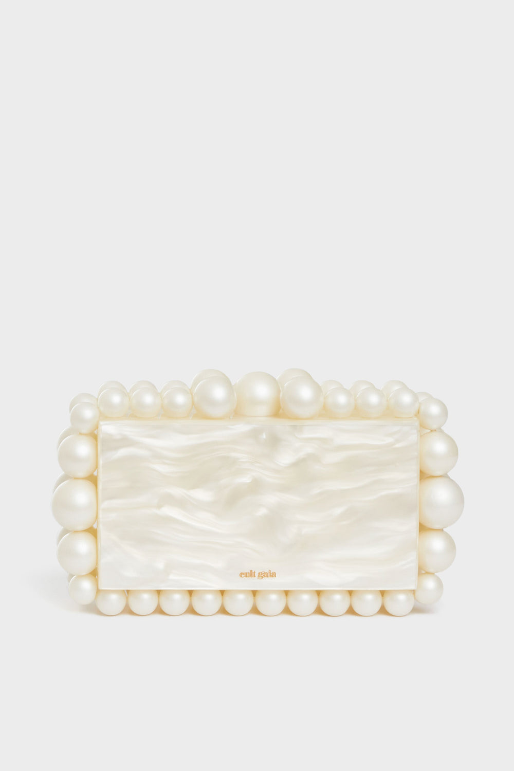A rectangular box clutch by Cult Gaia, featuring a pearlescent finish and accented with large and small acrylic pearl beads.