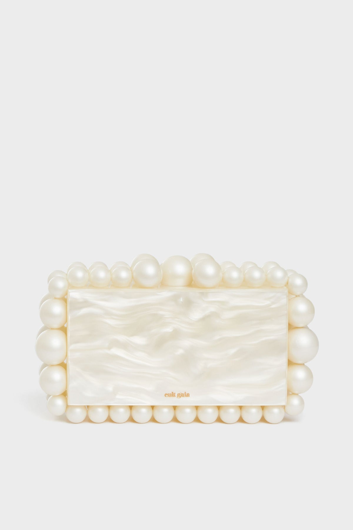 A rectangular box clutch by Cult Gaia, featuring a pearlescent finish and accented with large and small acrylic pearl beads.