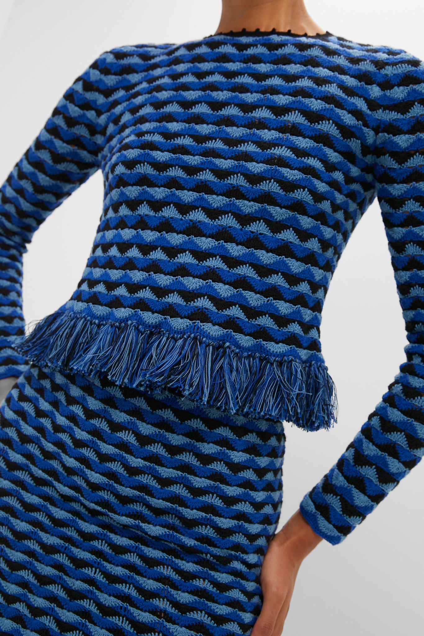 Blue and Black Profundo Midi Skirt in a classic, effortless knit set featuring a bold three-tone wave pattern and fringe trim, embodying high-end, fun style.