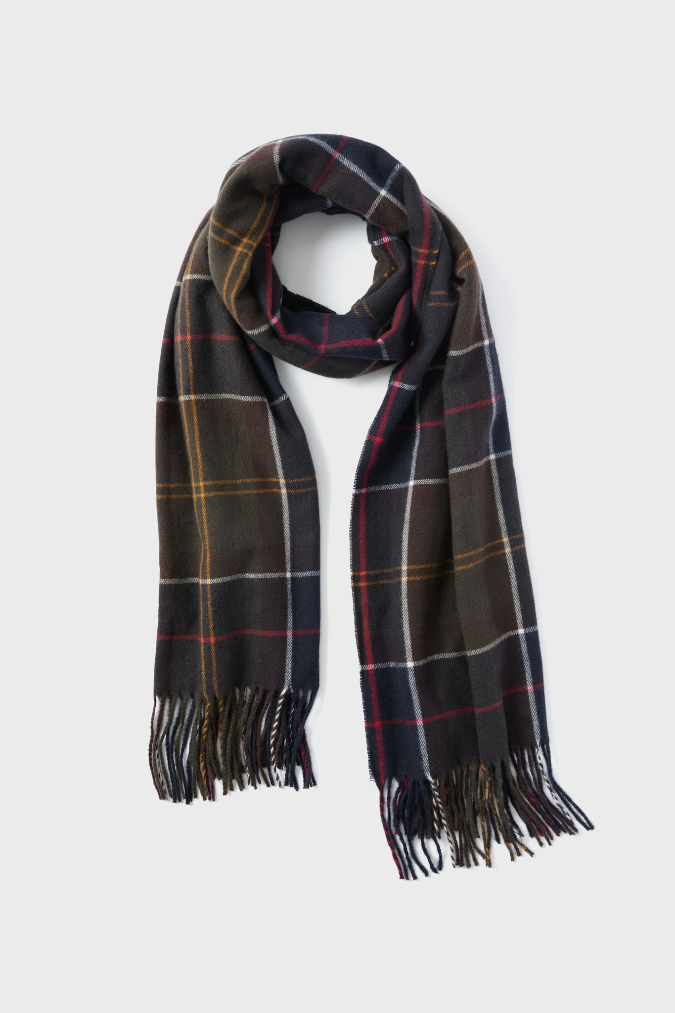 A Barbour dark tartan wrap with red, white, and yellow lines features a fringed hem and is styled in a loose loop.