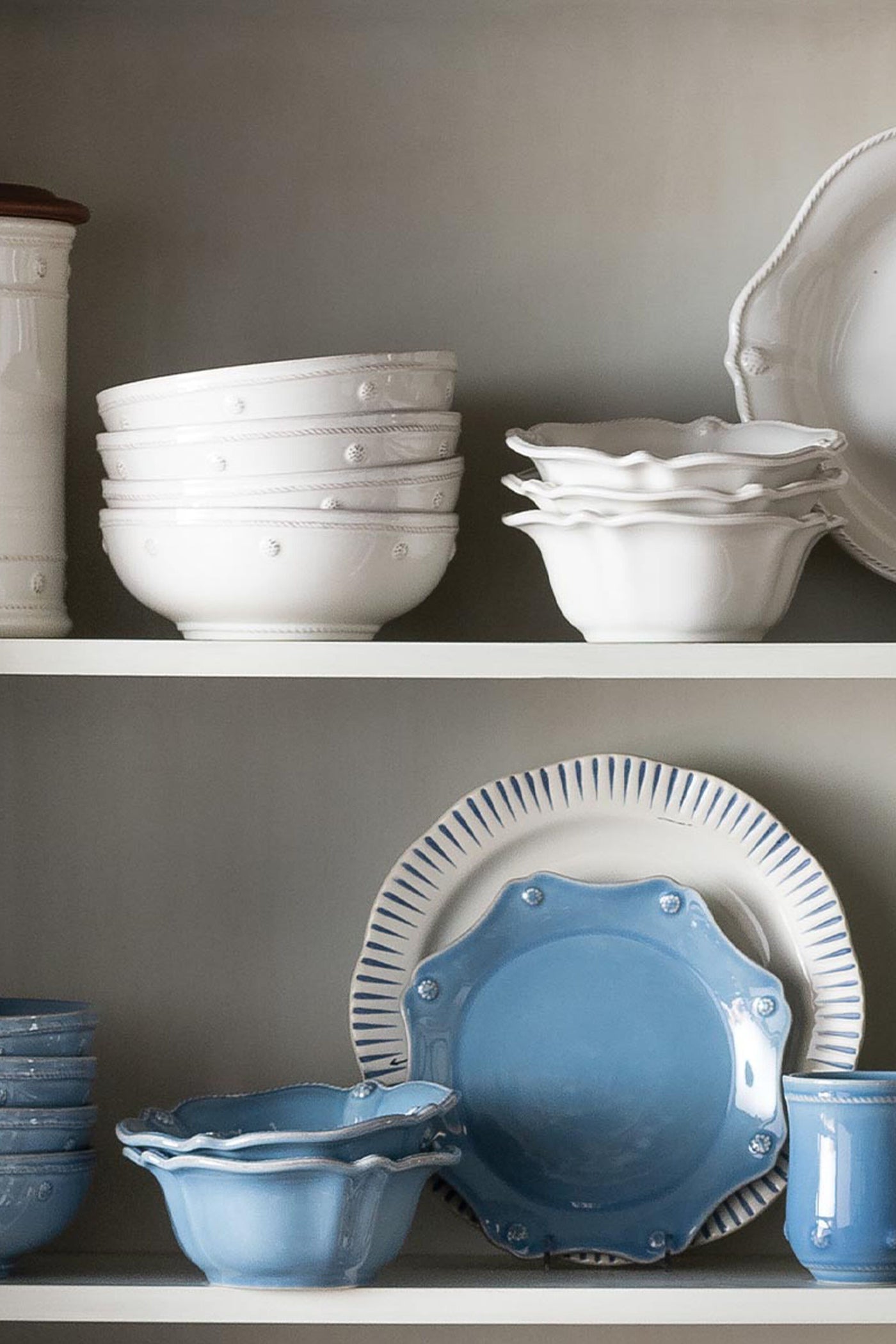 Chambray Berry & Thread Flared Cereal/Ice Cream Bowl, showcasing a classic, effortless design with scalloped edges, on open shelving alongside coordinating dinnerware for a fun, high-end dining experience.