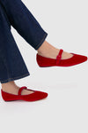 Red Velvet Ginger Mary Jane Flats, featuring classic design with a rounded toe and adjustable strap, worn effortlessly with denim for a fun, high-end look.