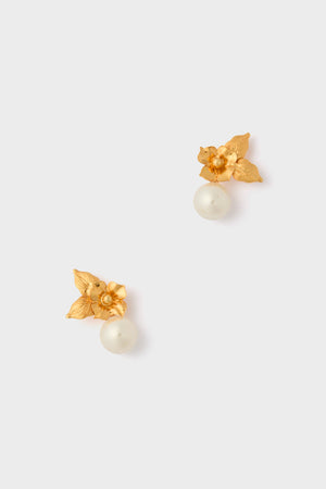 Handmade in New York, Jennifer Behrs gold floral stud earrings with a white pearl drop are perfect for those seeking luxury accessories.