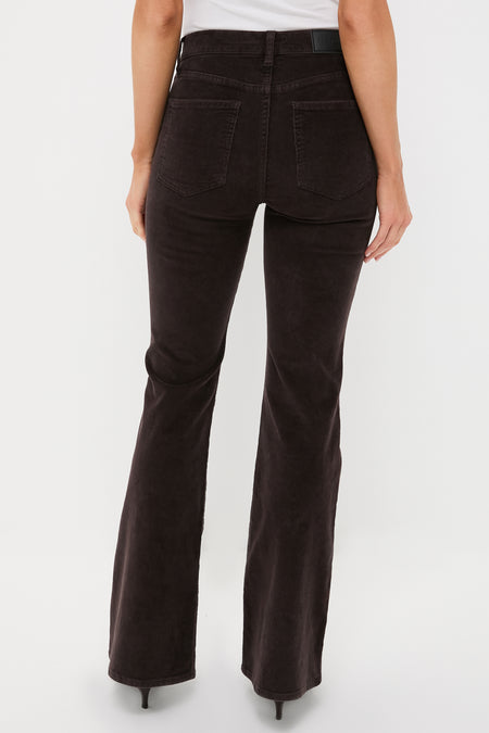 Back view of person wearing Mocha Kinsley Mid Rise Ultra Flare Cord pants, showcasing classic high-waisted fit with effortless, fun, and high-end ultra flare silhouette.