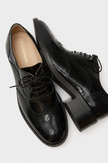 Black Leather Brogue Oxford Shoes featuring classic wingtip perforations, lace-up closure, and a block heel for an effortlessly cool and high-end look.