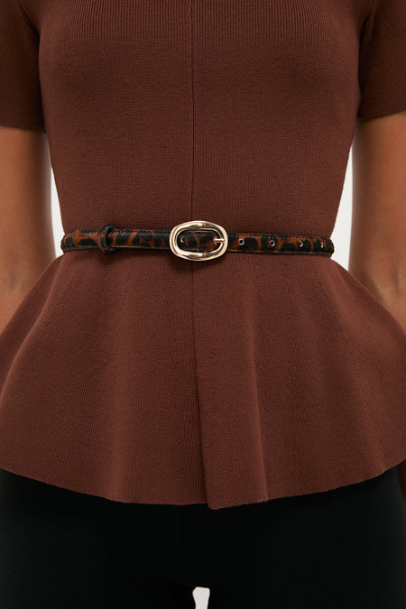 Classic elegance meets effortless style with the Leopard Haircalf Oval Buckle Skinny Belt, featuring a sleek oval gold-tone buckle, perfect for a high-end, fun look.