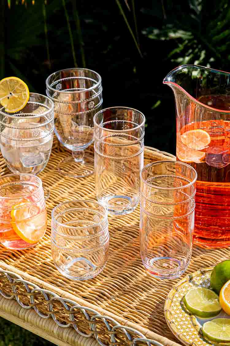 Classic outdoor setup featuring the Isabella Acrylic Stemless Wine Glass Set of 4, perfect for effortless, fun al fresco entertaining with high-end style.