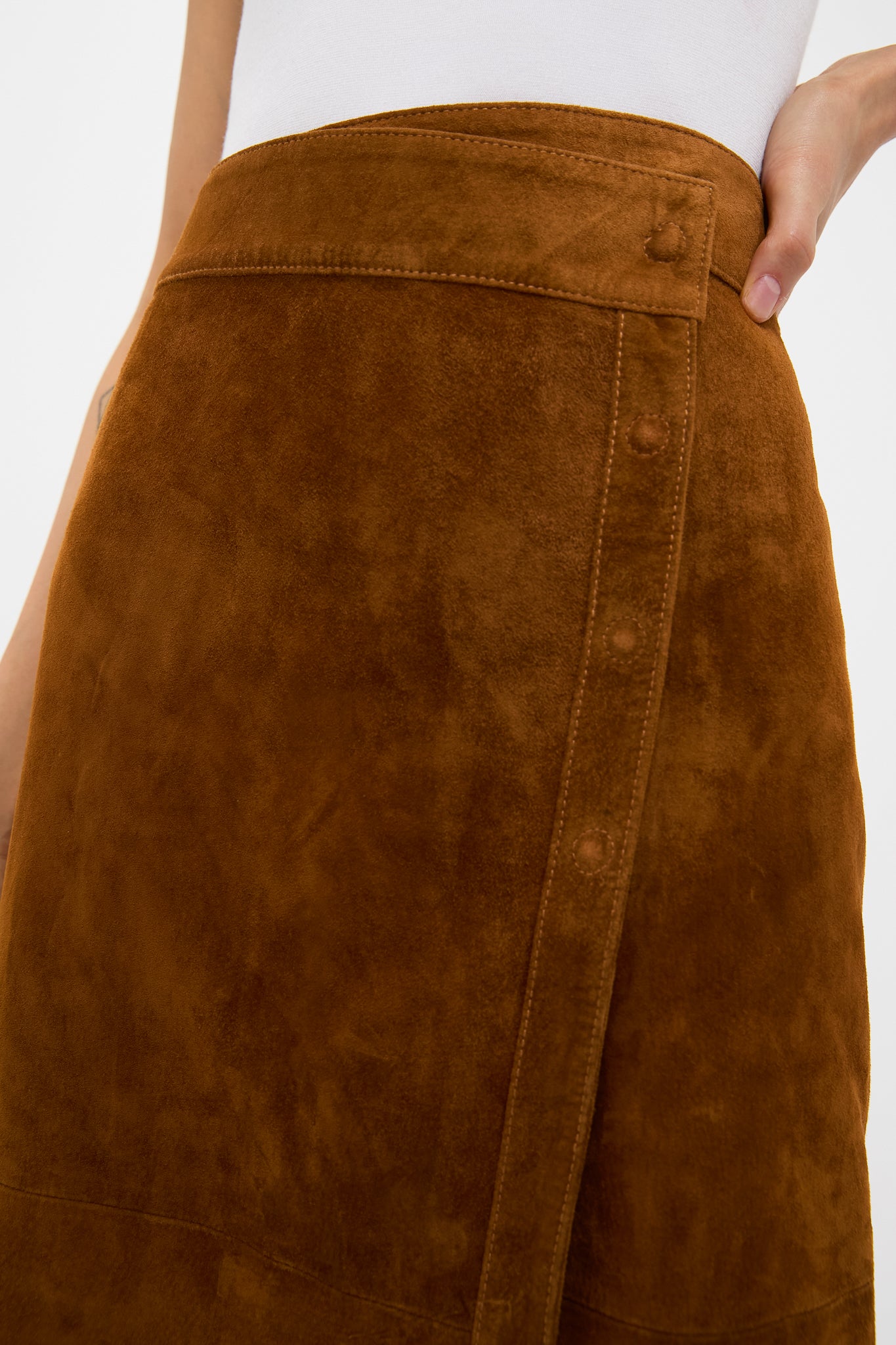 Nutmeg Winona Skirt in suede, featuring a classic wrap design with side snap detail, creating an effortless, high-end look perfect for fall dressing.