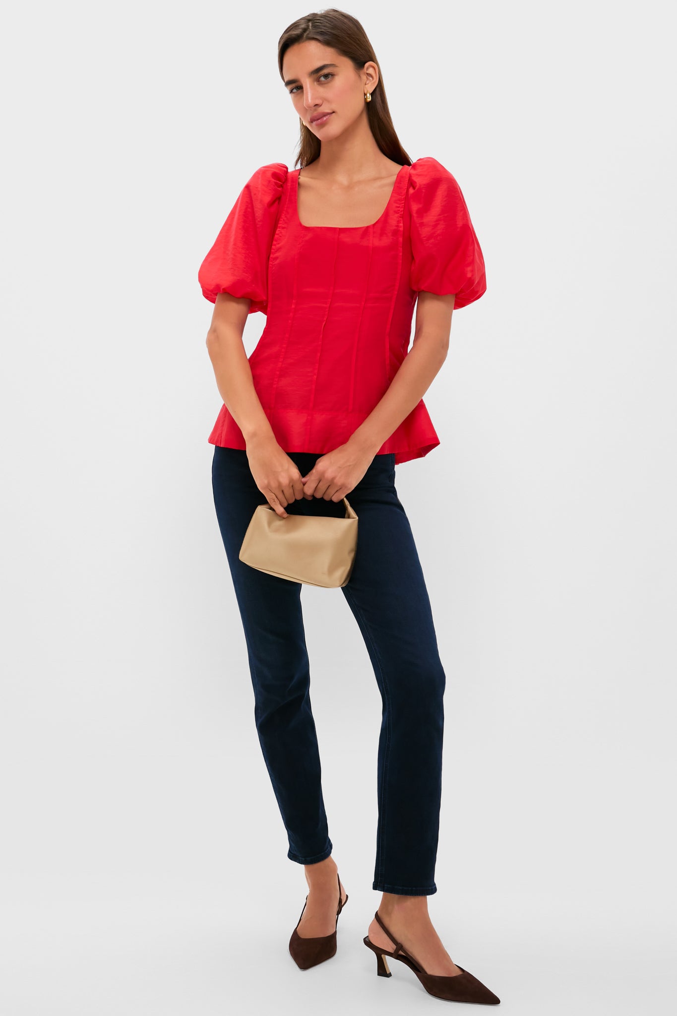 Ruby Taffeta Annalise Blouse: A classic, high-end top with puff sleeves and a flared silhouette, styled effortlessly with dark denim and chic accessories. Perfect for fun outings.