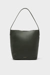 The Mansur Gavriel structured tote is crafted from dark green Italian leather with a single shoulder strap, minimal design, and subtle gold branding near the bottom center.