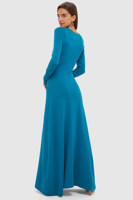 Model in a classic, full-length Nocturnal Blue Dora Long Sleeve Maxi Dress, showcasing effortless, fun style with a crew neck and slight A-line silhouette.