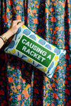 Causing A Racket Needlepoint Pillow
