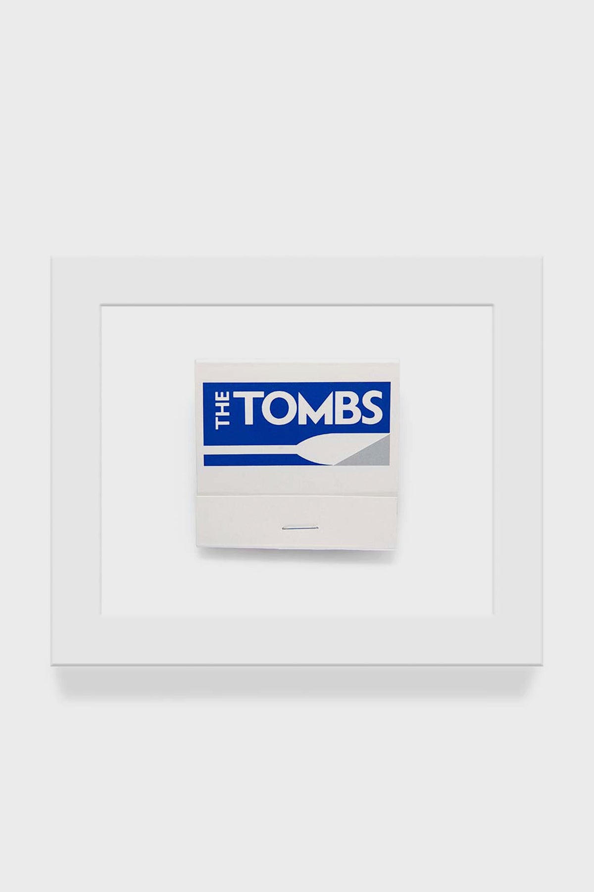 Matchbook Diaries by Charles Ryan Clarke features a unique framed Georgetown matchbook with a blue and white THE TOMBS cover as matchbook art.