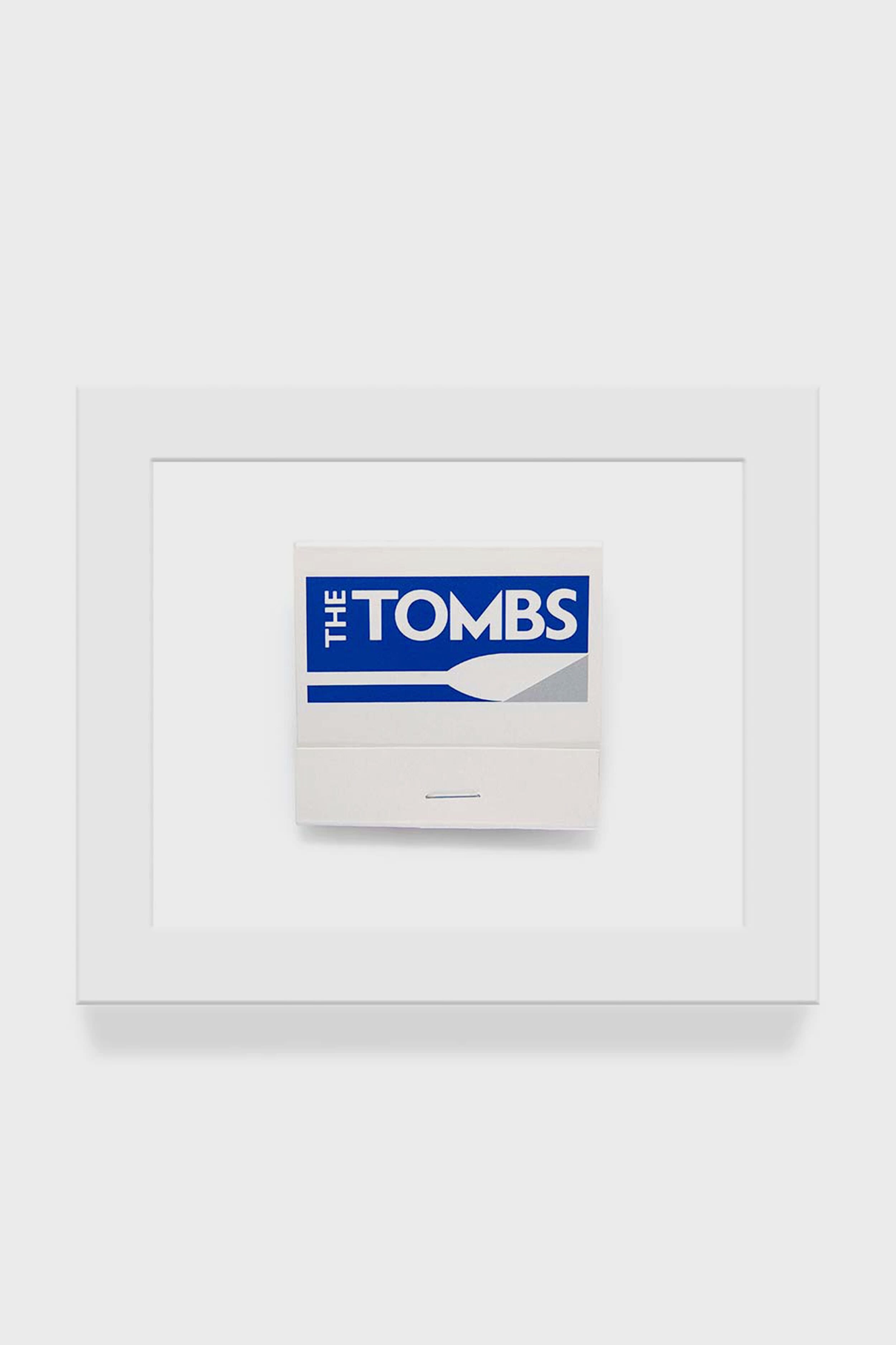 Matchbook Diaries by Charles Ryan Clarke features a unique framed Georgetown matchbook with a blue and white THE TOMBS cover as matchbook art.