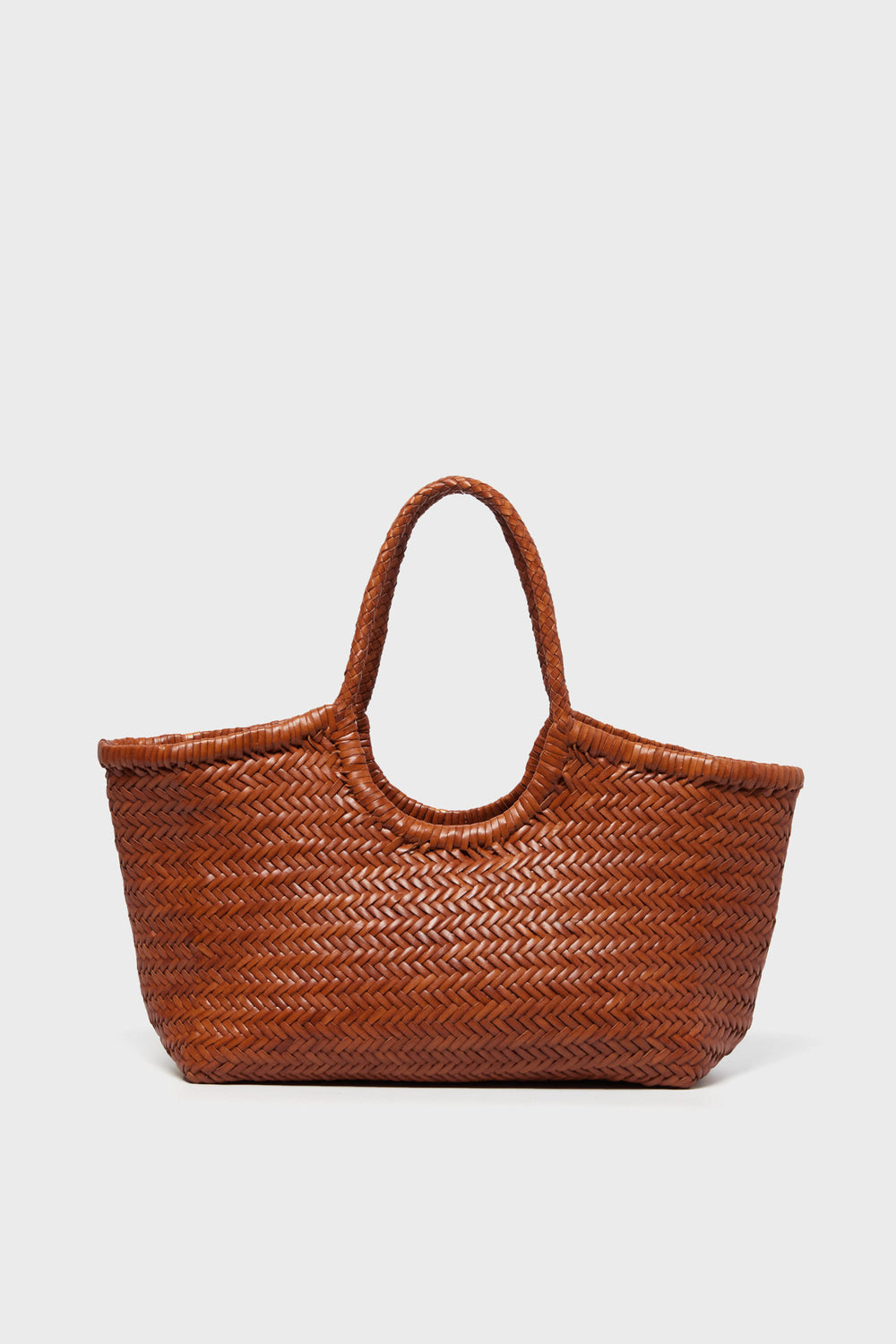 A brown handwoven tote basket bag by Dragon Diffusion is shown, featuring two handles and crafted with intricate detail.