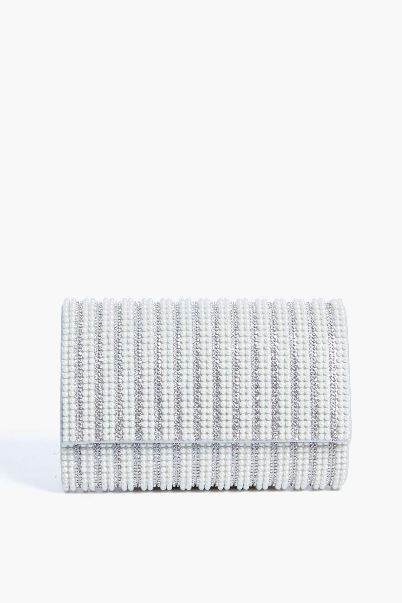 The Olga Berg rectangular silver clutch features a textured ribbed design, flap closure, and crystal embellishments, making it perfect for special occasions.