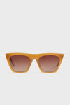 DIFF Eyewear cat-eye sunglasses featuring orange frames, brown gradient lenses, and UVA/UVB protection.