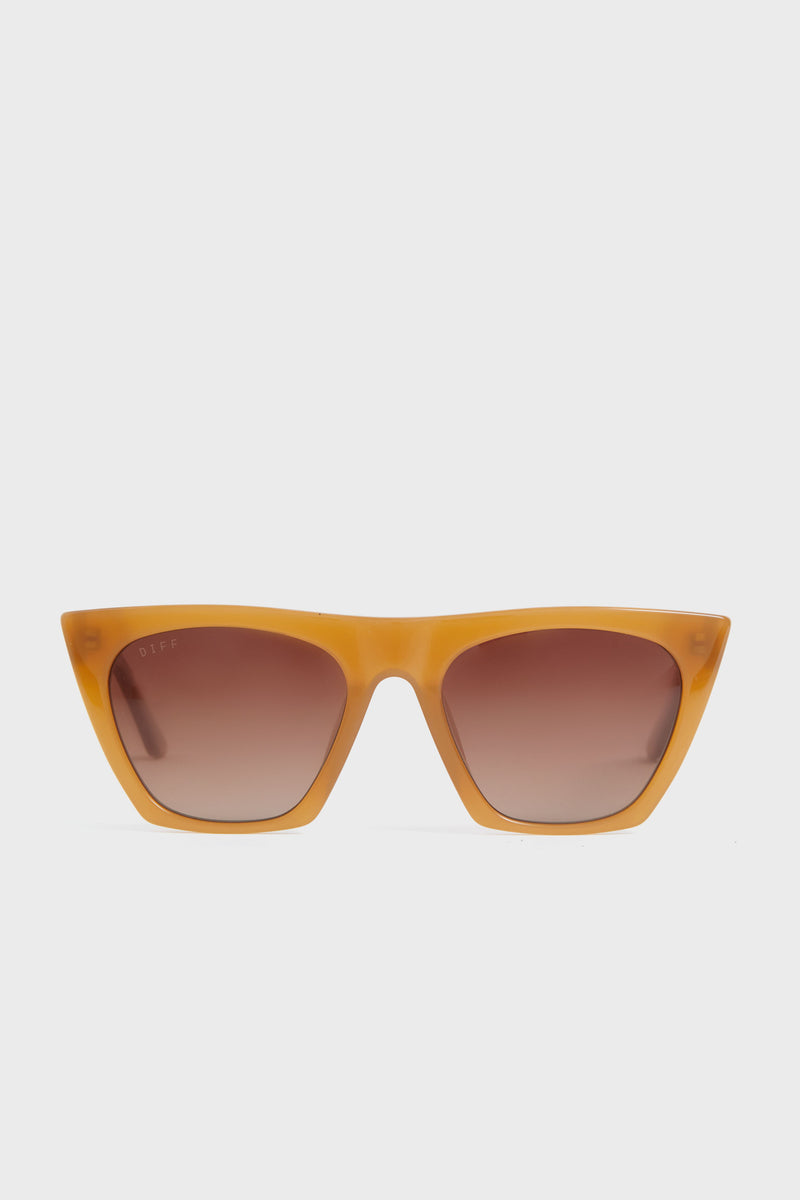 DIFF Eyewear cat-eye sunglasses featuring orange frames, brown gradient lenses, and UVA/UVB protection.