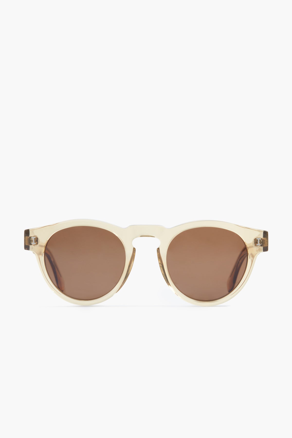 Illesteva beige oval sunglasses with brown tinted lenses, handmade in Italy.