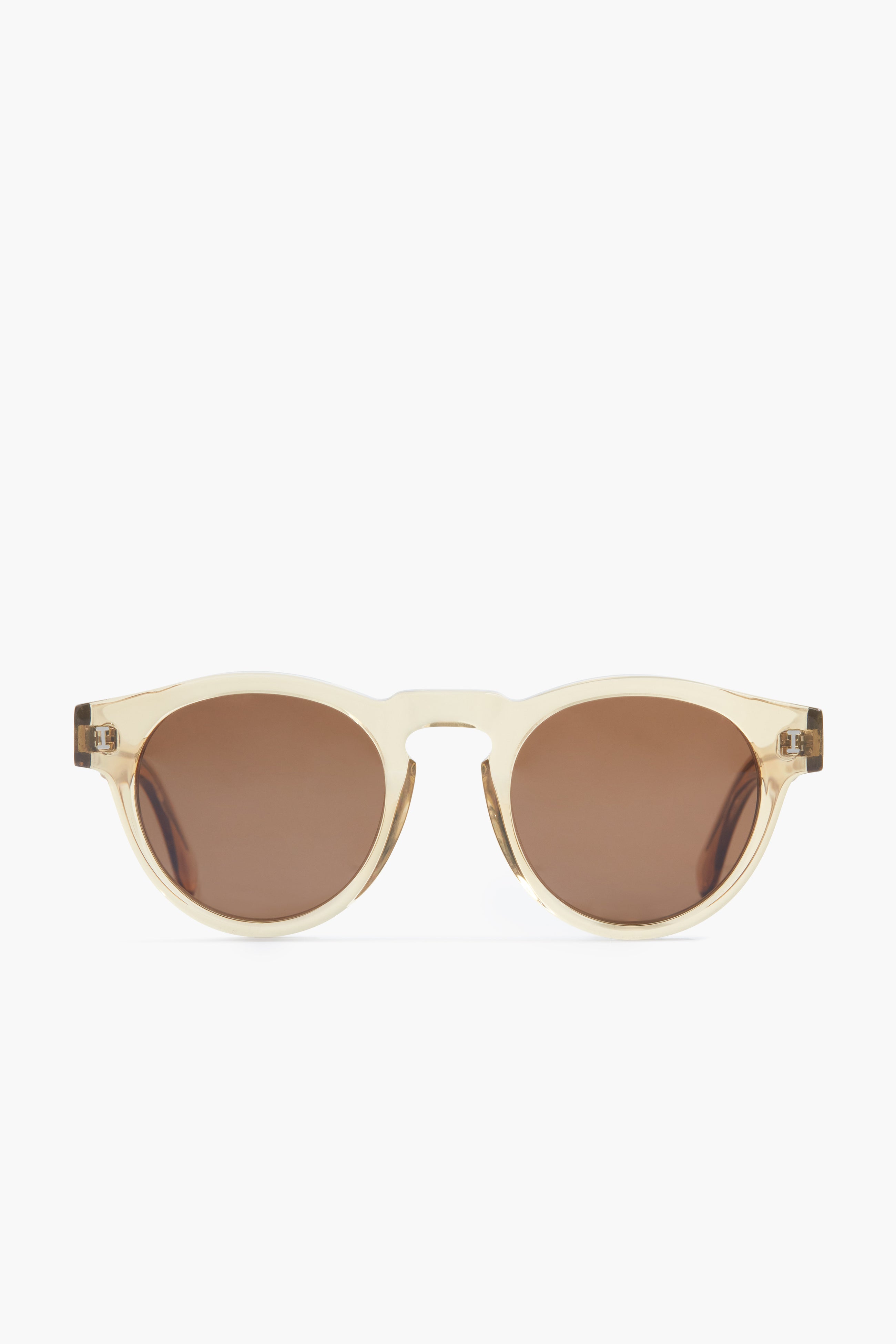 Illesteva beige oval sunglasses with brown tinted lenses, handmade in Italy.
