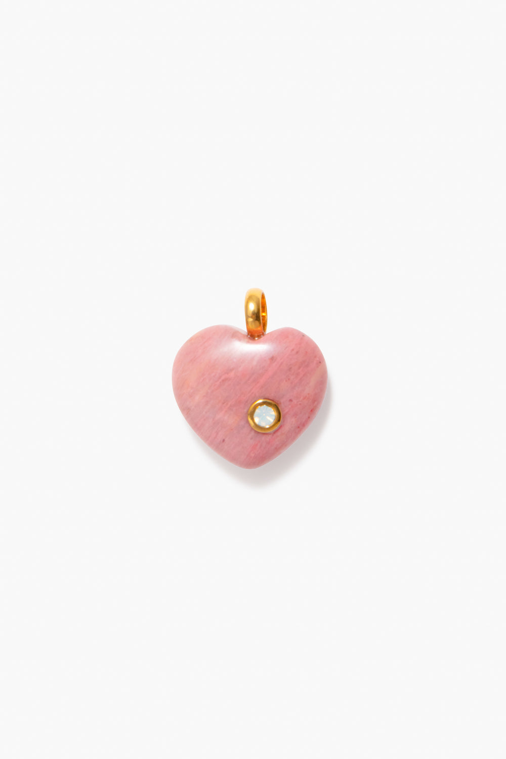 Tuckernuck Jewelry’s pink heart-shaped pendant features a small round gemstone and gold loop, making it the perfect Opal Birthstone Charm or October birthday gift for a charm necklace.