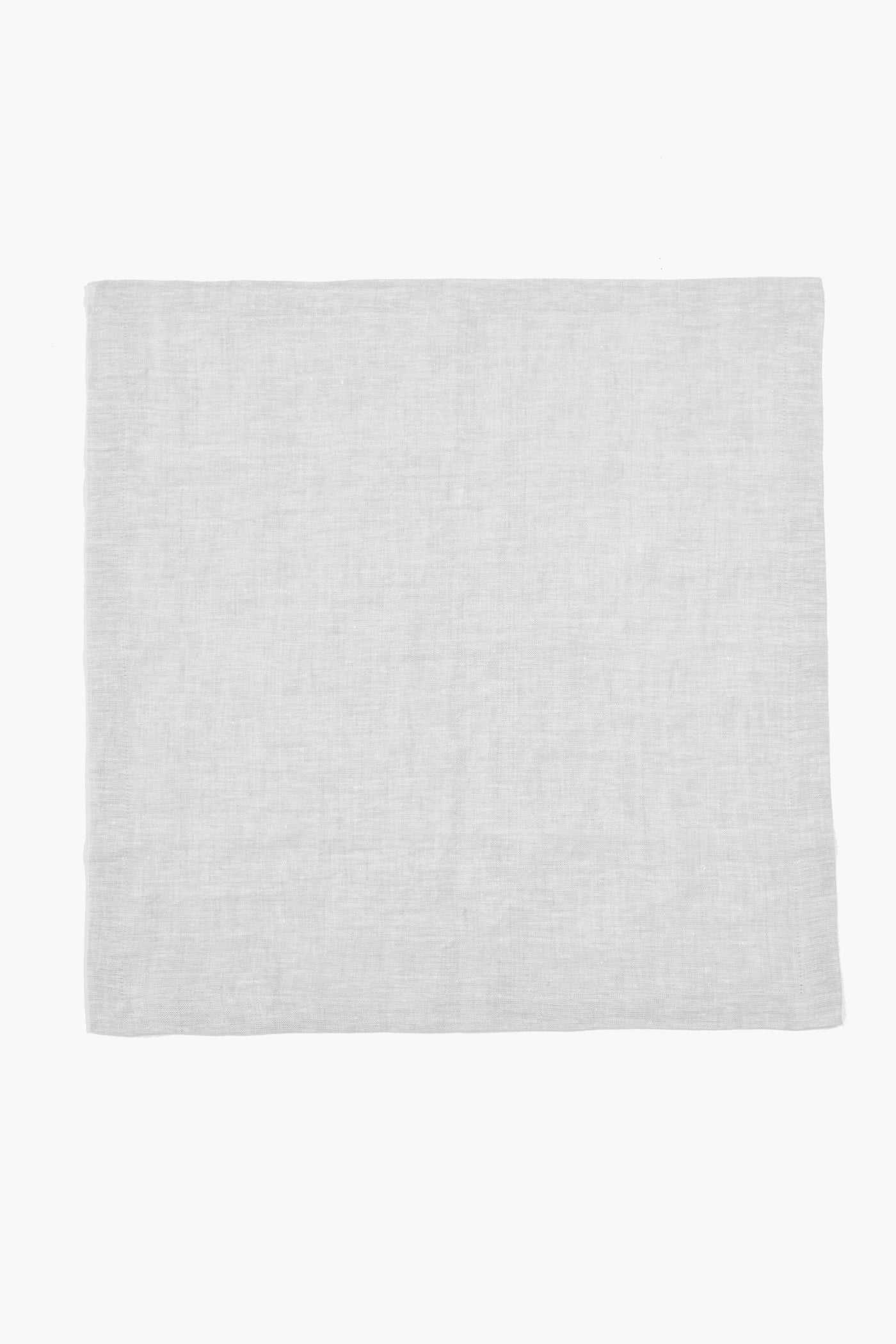 Stone Washed Linen Napkins, a classic, light-grey woven fabric piece, embody effortless elegance. Perfect for any meal, these high-end, hand-sewn napkins add fun sophistication.
