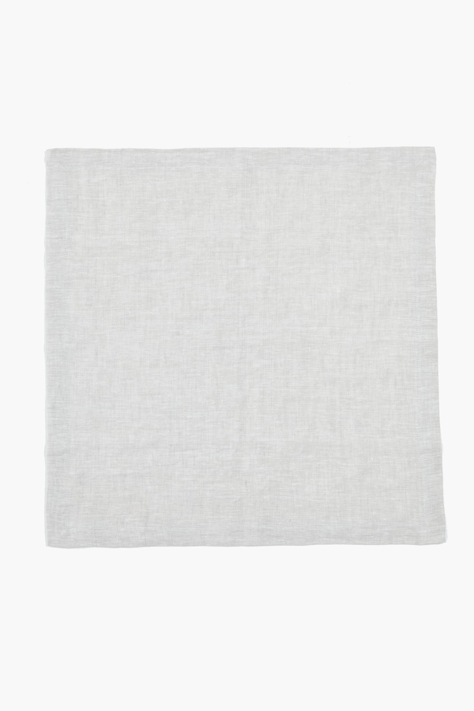 Stone Washed Linen Napkins, a classic, light-grey woven fabric piece, embody effortless elegance. Perfect for any meal, these high-end, hand-sewn napkins add fun sophistication.