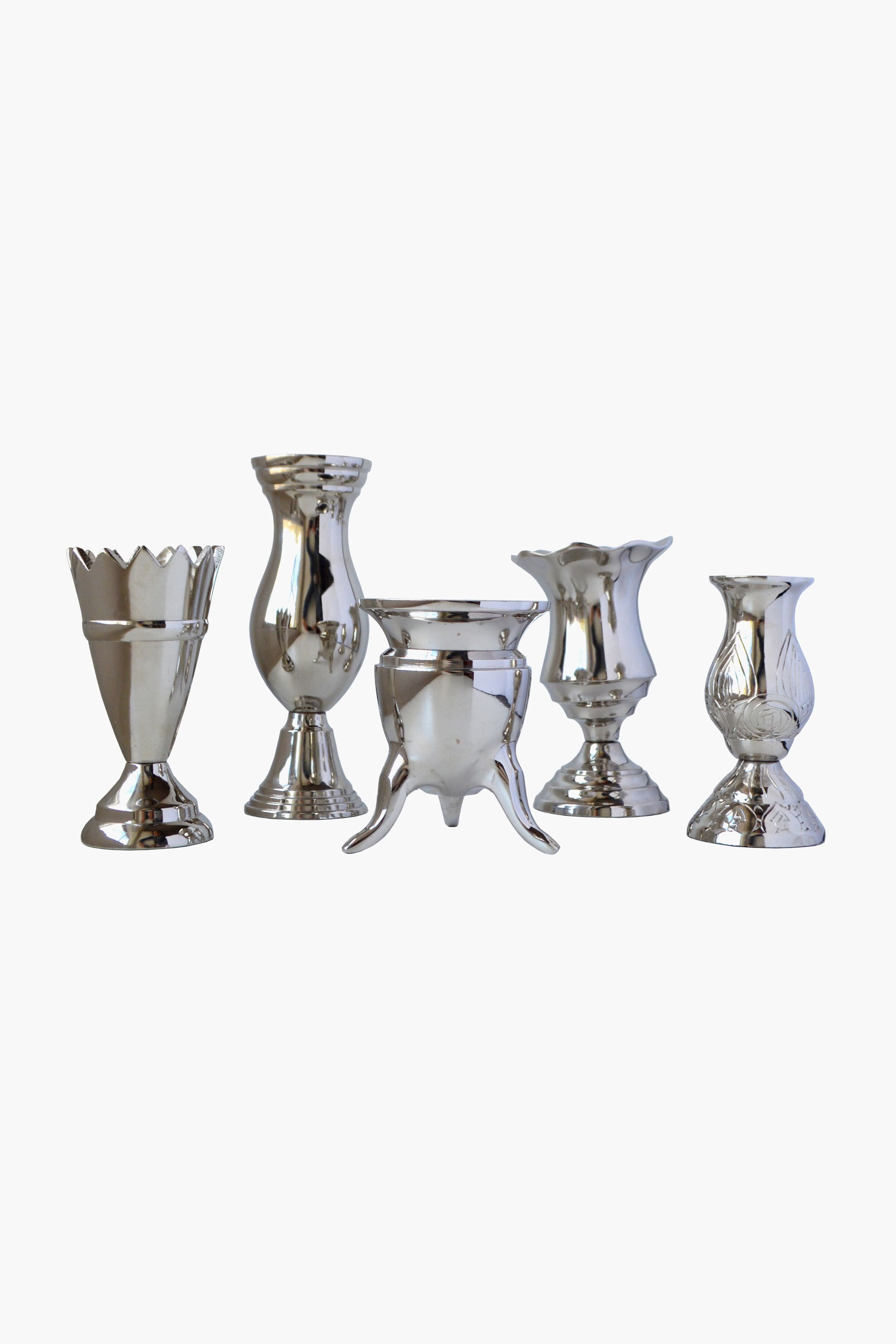 Five assorted silver-colored handcrafted aluminum vases by Chefanie are displayed in a row, perfect as Silver Bud Vases for elegant table decor.