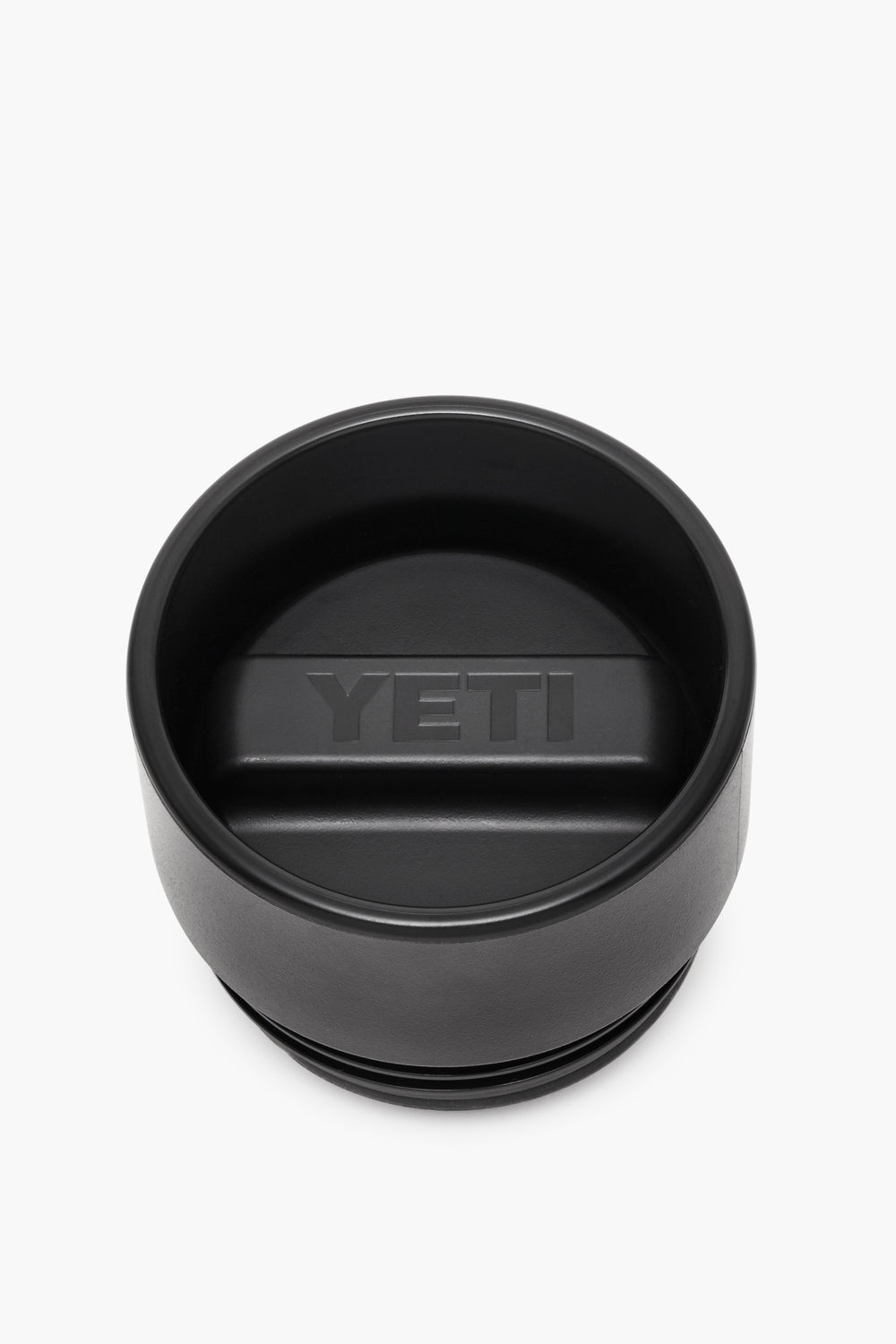 YETI black tumbler lid with a central raised handle and embossed logo, crafted as an insulated, leakproof cap for your Rambler bottle.