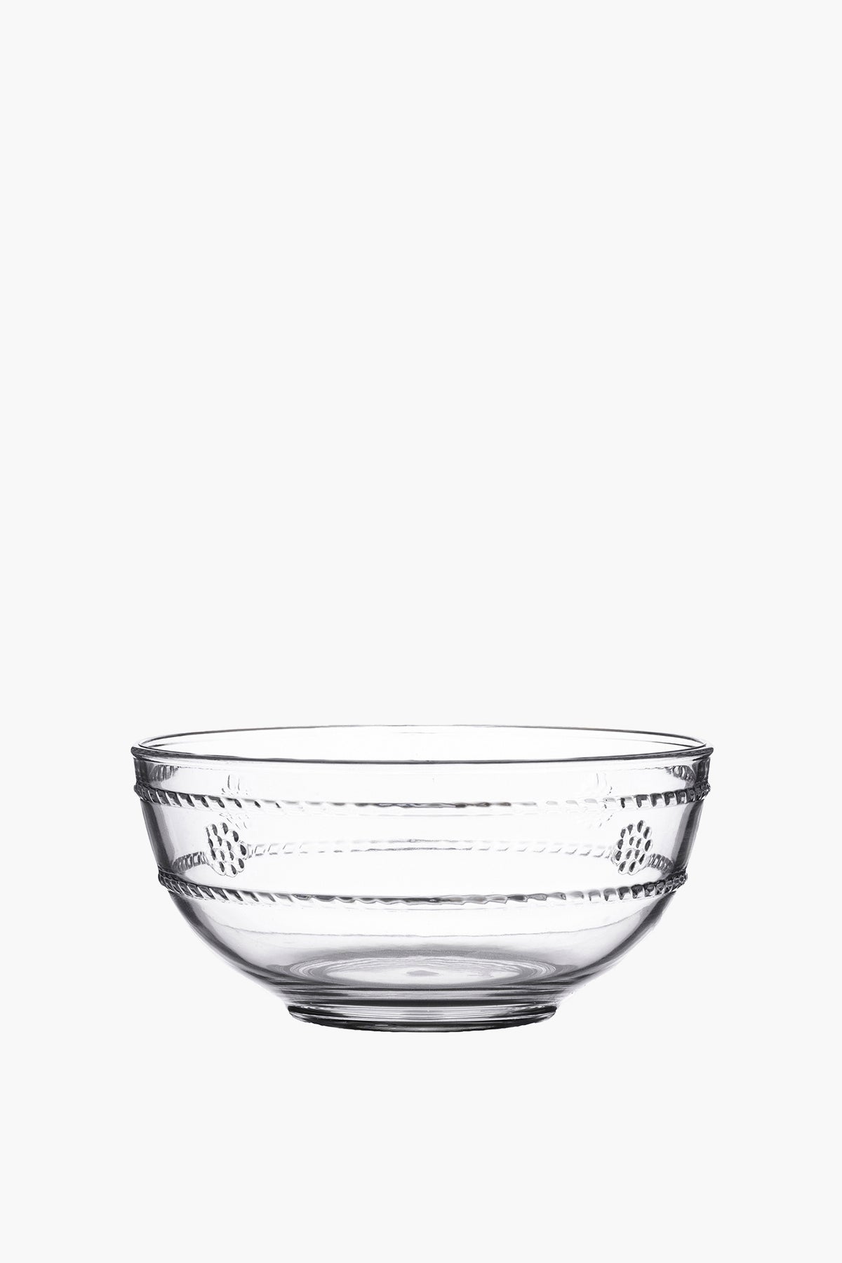 Juliska clear glass bowl with a simple round shape and subtle horizontal grooves, inspired by the Al Fresco Collection, is perfect for versatile serving.