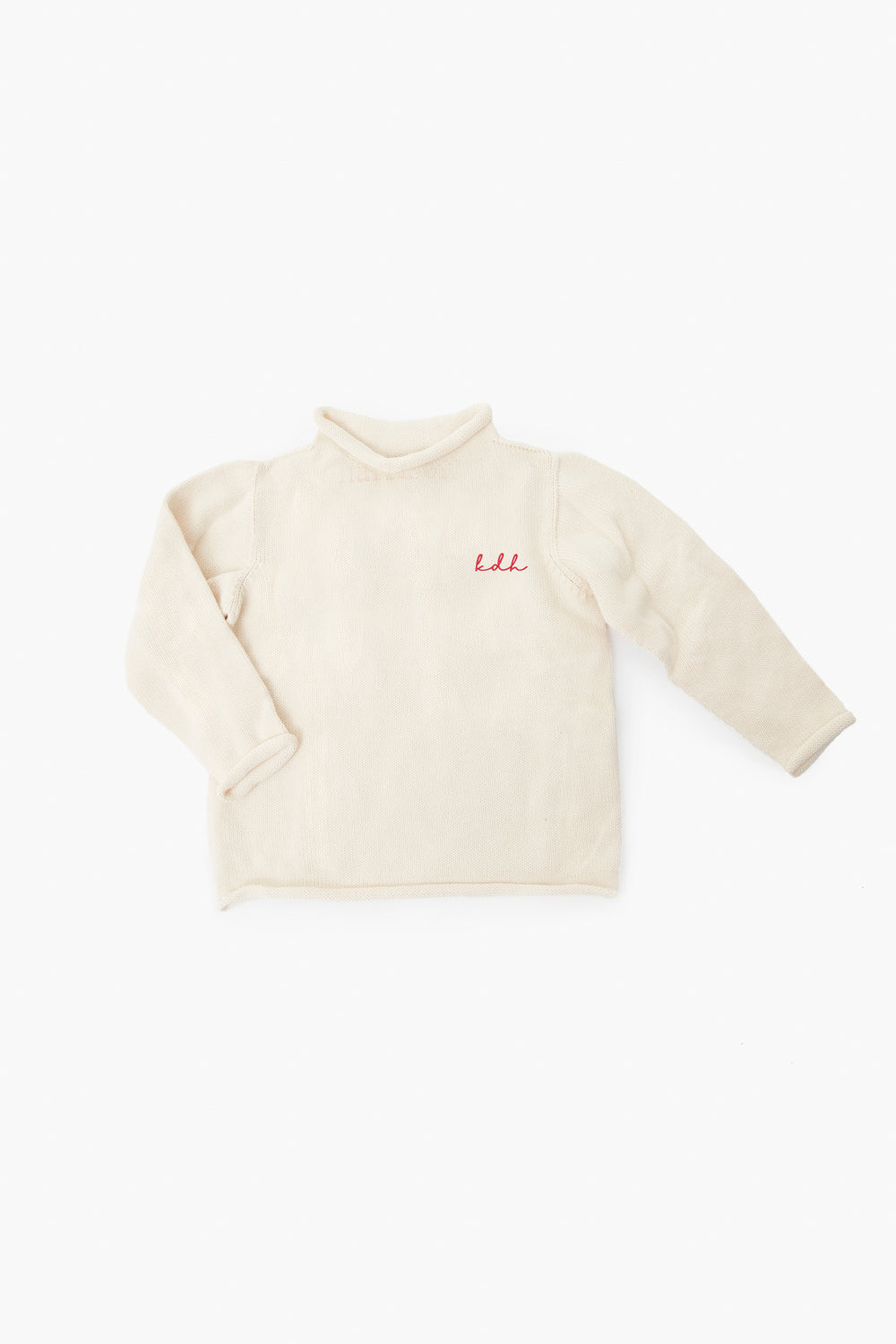 A Soft Idea beige long-sleeve fleece shirt with a high collar and red lali chest embroidery, inspired by the Natural Roll Neck Sweater and crafted as a cotton essential.