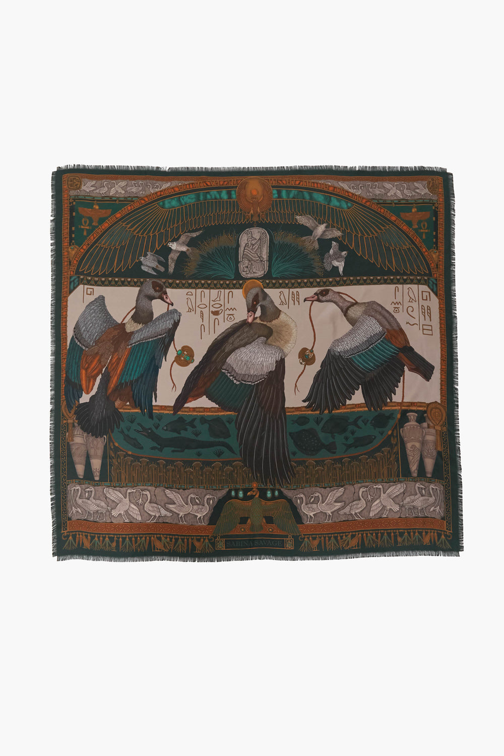 Rectangular silk scarf by Sabina Savage with an Egyptian motif, depicting birds, hieroglyphics, and ornate patterns in green, gold, and brown tones.