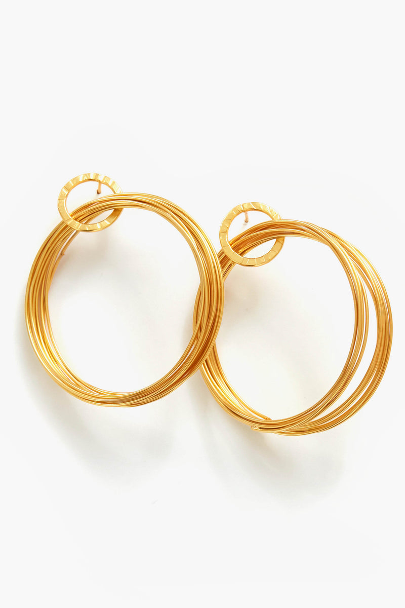 Modafleur gold-plated brass hoop earrings featuring multiple intertwined loops and circular studs, perfect for making a bold statement.