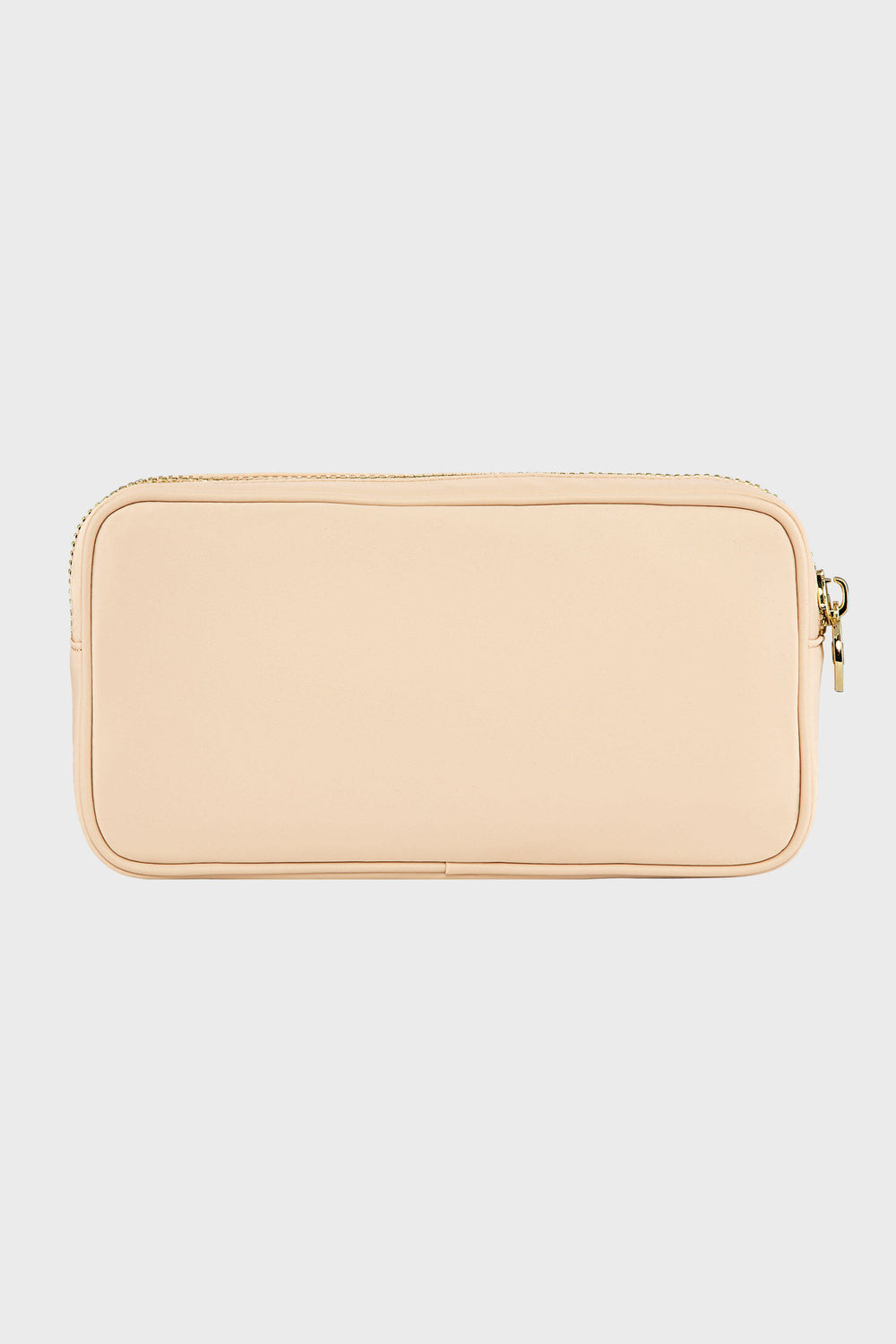 A Stoney Clover Lane rectangular beige zippered pouch with a smooth surface, perfect as a small makeup organizer or travel accessory.