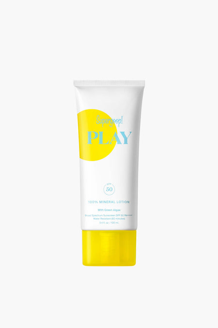 A tube of Supergoop! 100% Mineral Lotion SPF 50, a reef-friendly mineral sunscreen featuring a white body, yellow cap, and yellow label design.