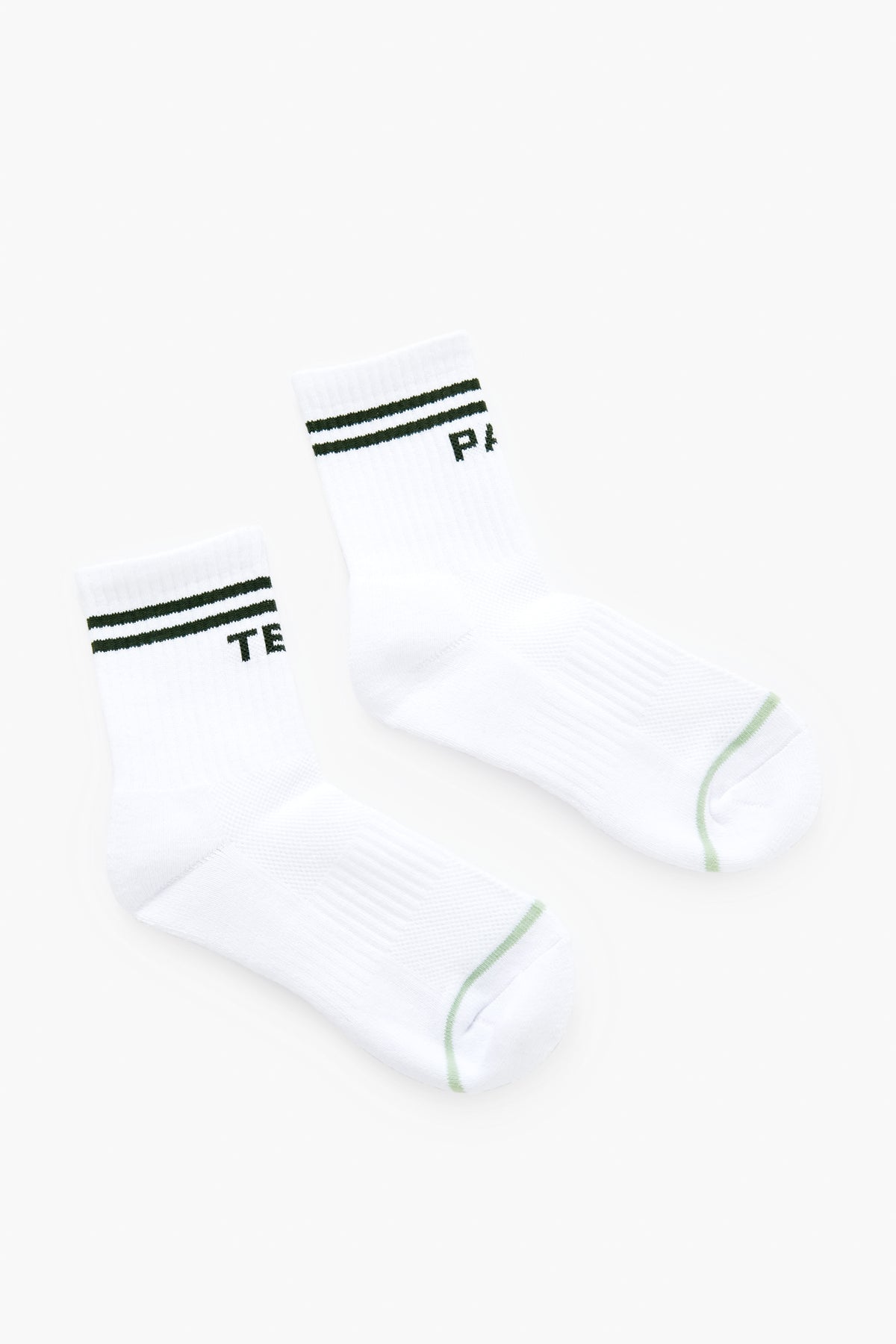 Tnuck Sport Par Tee Socks: Crew-length socks with white fabric, green toe accents, two green cuff stripes, and partial green text. Stylish and breathable for all-day comfort.
