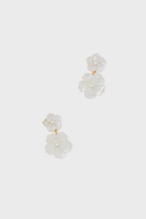 Jennifer Behr gold-tone drop earrings feature two white flower-shaped pendants on each earring, making them a luxurious addition to your accessories collection.