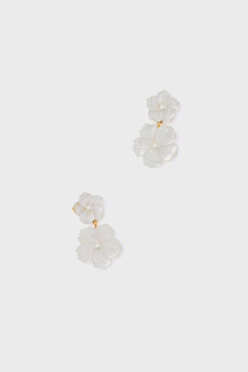 Jennifer Behr gold-tone drop earrings feature two white flower-shaped pendants on each earring, making them a luxurious addition to your accessories collection.