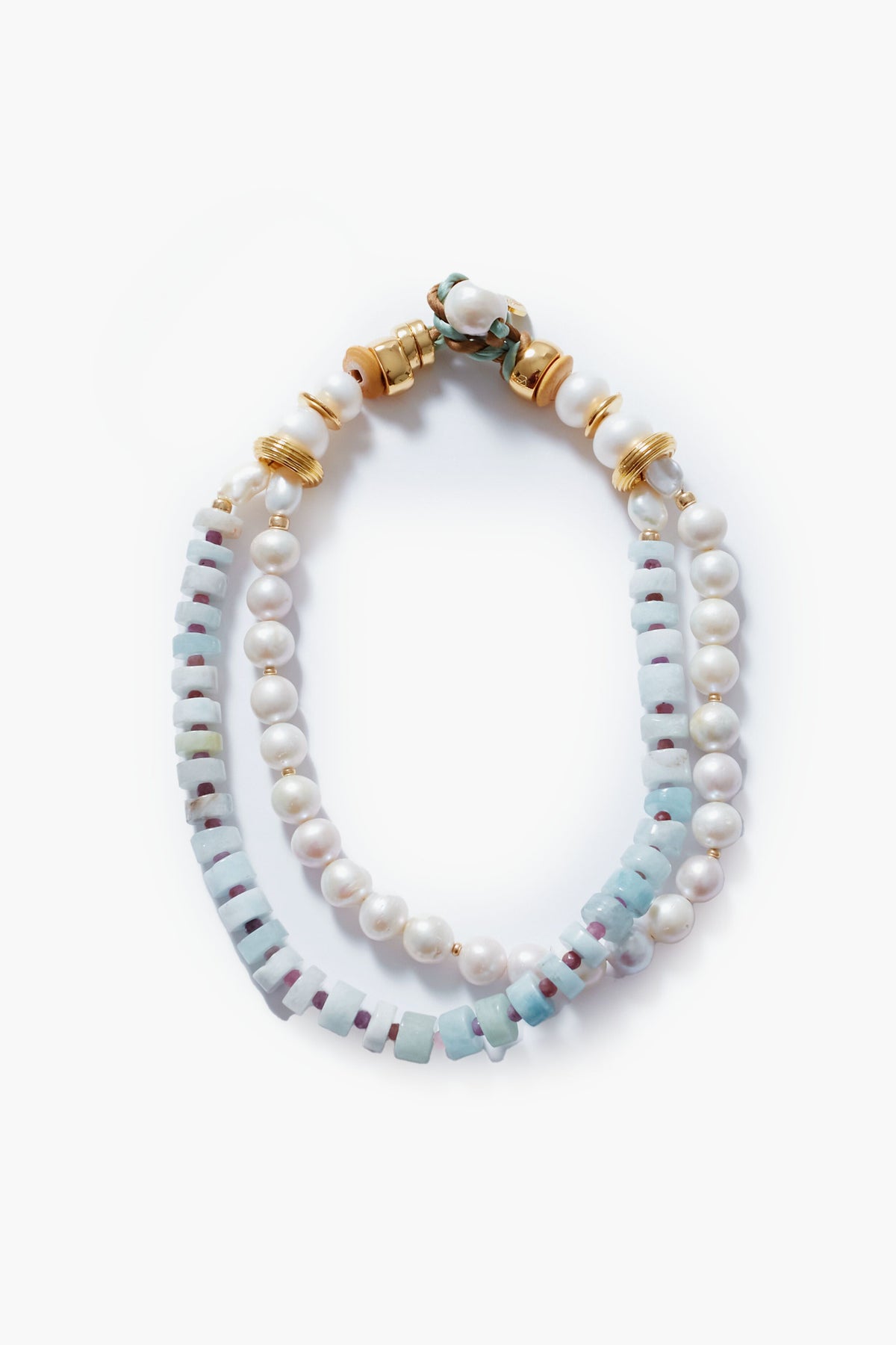 The Lizzie Fortunato bracelet is double-stranded with white pearls, light blue square beads, gold-plated accents, and a decorative clasp.