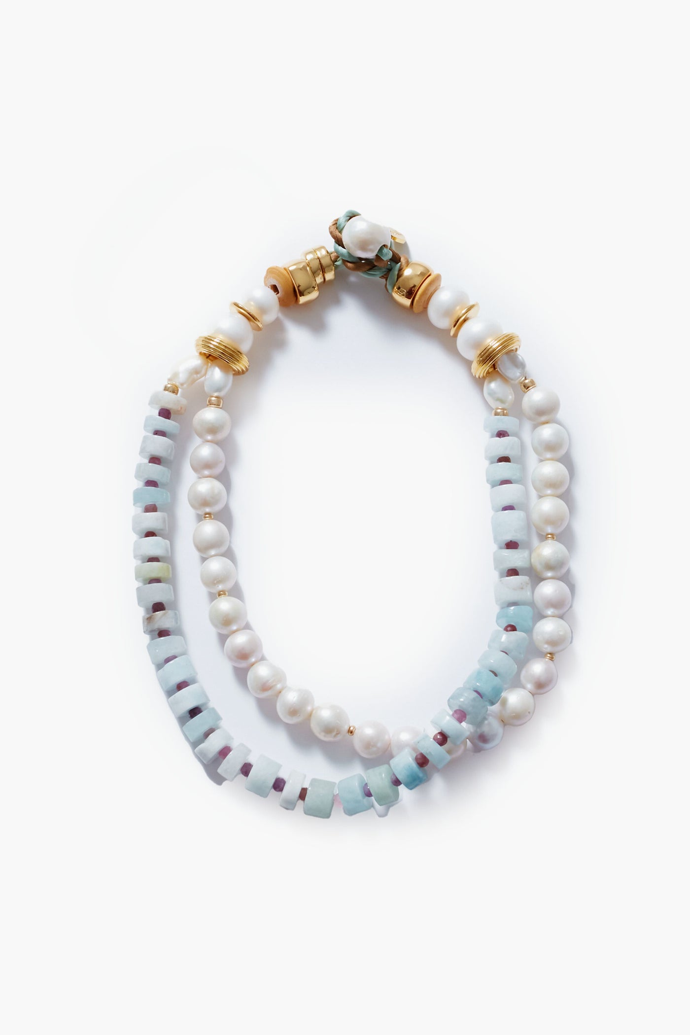 The Lizzie Fortunato bracelet is double-stranded with white pearls, light blue square beads, gold-plated accents, and a decorative clasp.