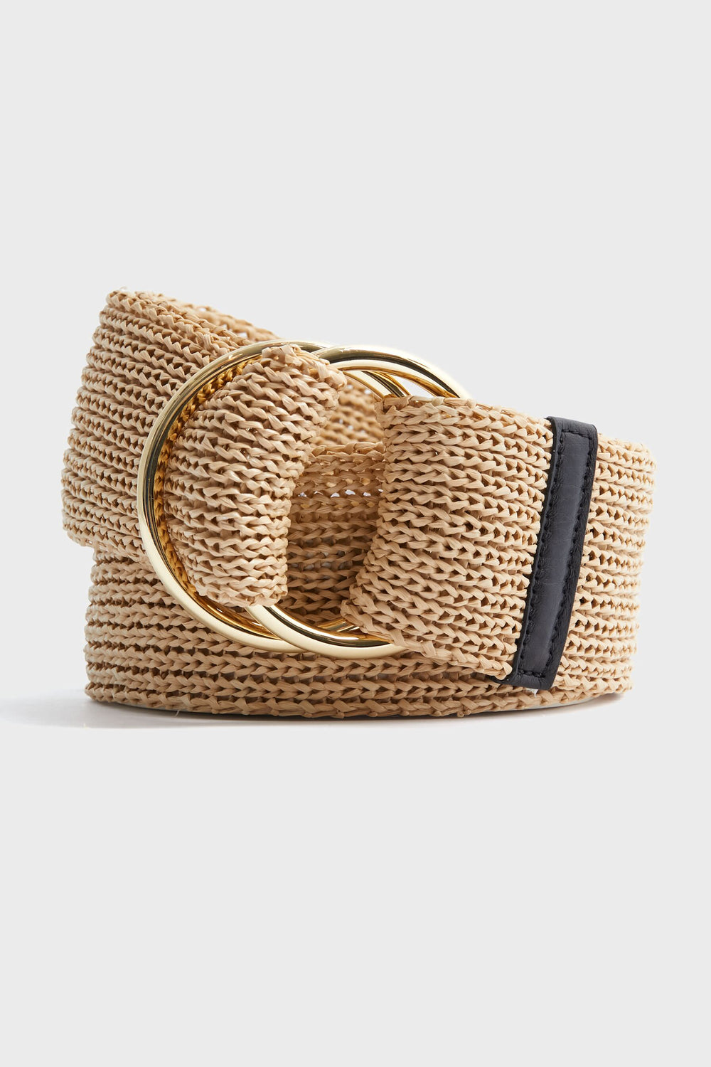 The B-Low the Belt wide woven straw belt in beige features a double gold circular buckle and a black faux leather accent, perfect for adding bohemian style to your look.