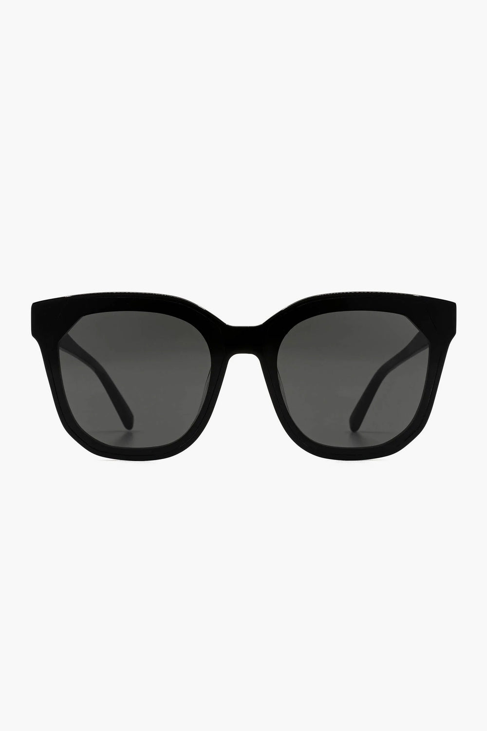 DIFF Eyewear’s black rectangular oversized sunglasses feature thick frames, dark tinted lenses, and UVA/UVB protection.