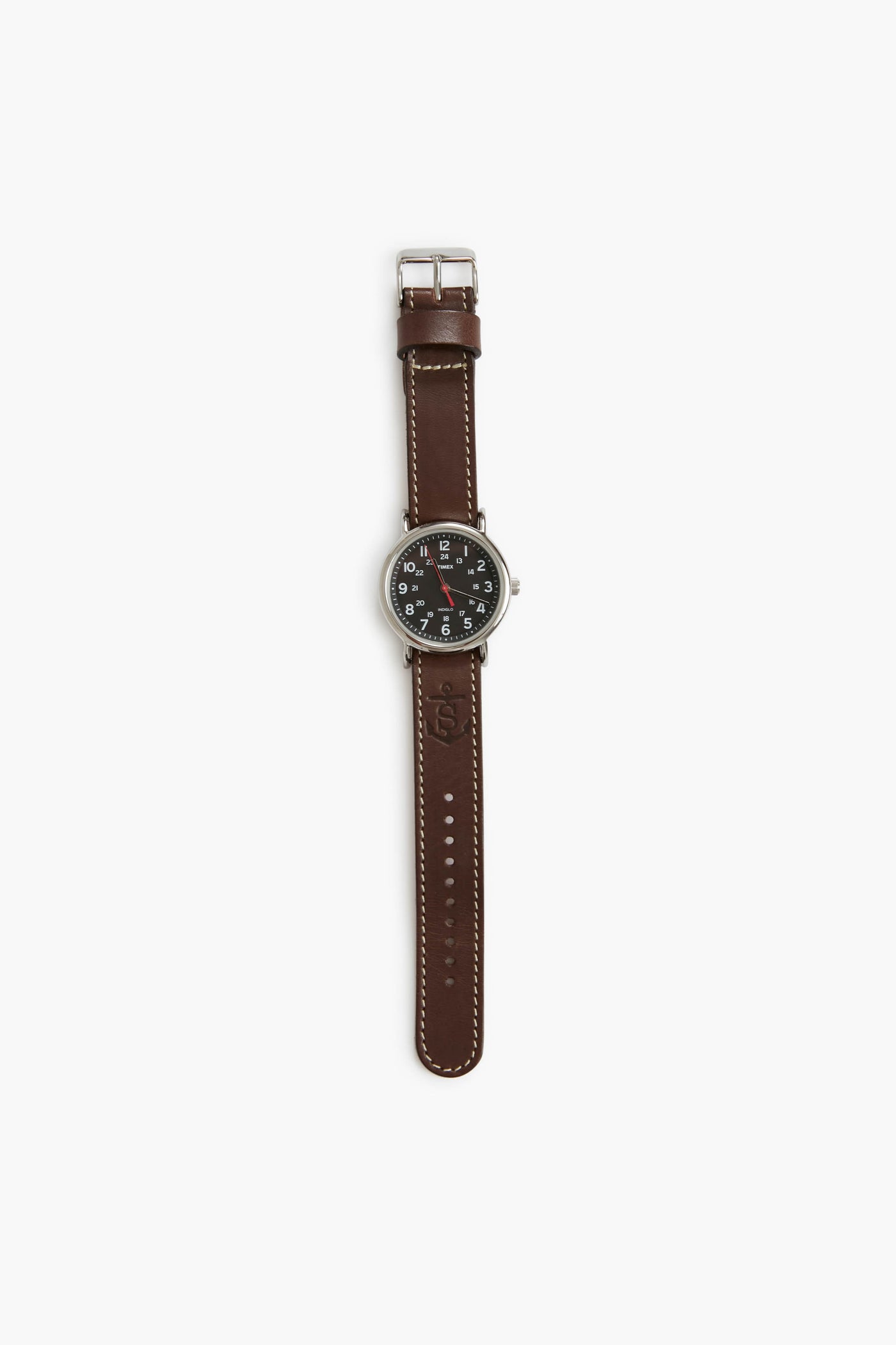 The Sounder Goods wristwatch features a handmade full-grain leather strap, silver buckle, and a black analog face with white numbers and hands.