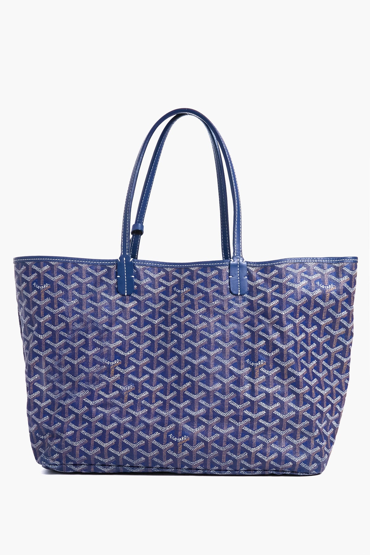 A blue Tuckernuck Archive Collection Saint Louis PM Tote Bag featuring an all-over geometric pattern, two handles, and signature Goyardine-style canvas.