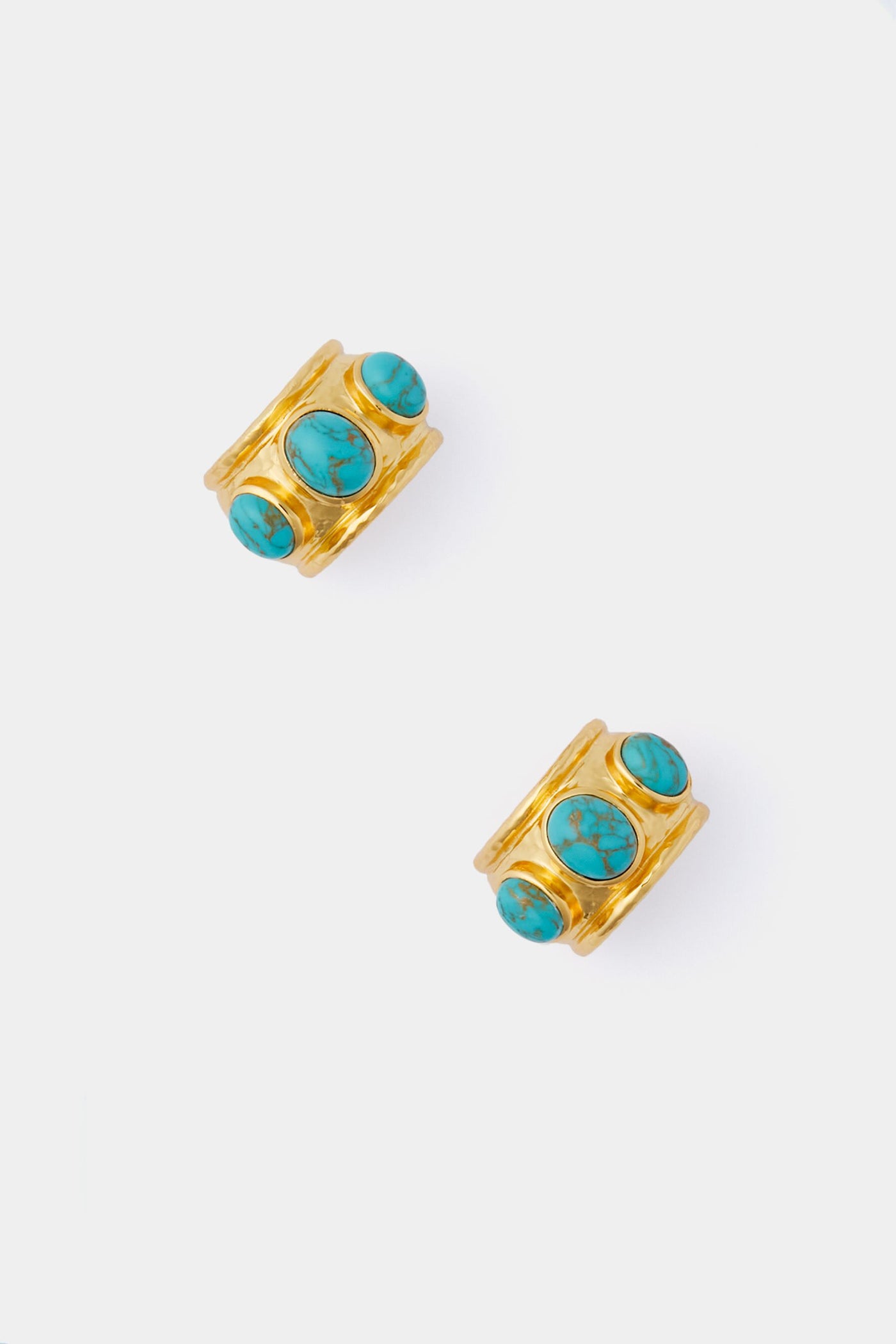 Two VALERE gold rings, each set with three oval turquoise natural gemstones in 24k gold-plated brass.