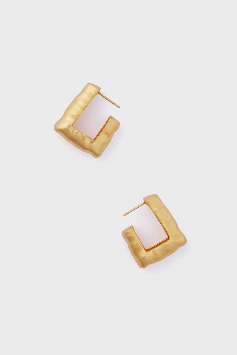 A pair of 24k gold-plated, square-shaped textured hoop earrings by VALERE, expertly handcrafted for a unique and elegant look.